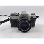 Canon AE-1 35MM Slr Film Camera Silver Fd 50MM 1:1.8 Lens Vintage Kit Used. Price: $189.00.