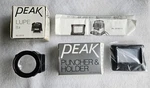 Peak Puncher & Holder Plus 8X Loupe W/boxes Made Japan! Very Hard To Find New. Price: $60.00.