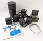 Minolta X-700 35MM Slr Film Camera With 4 Lenses, Panorama Head And Filters Used. Price: $299.99.