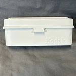 Kodak Metal Film Case-room For 5-35MM Rolls White 135 Print Used. Price: $24.95.